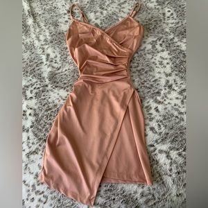 ROSE GOLD mini dress, never worn. The size is in a small.